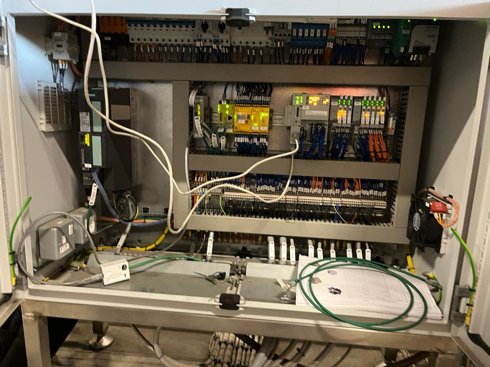 Open control panel showing safety relay, Siemens drive and distributed safety I/O.