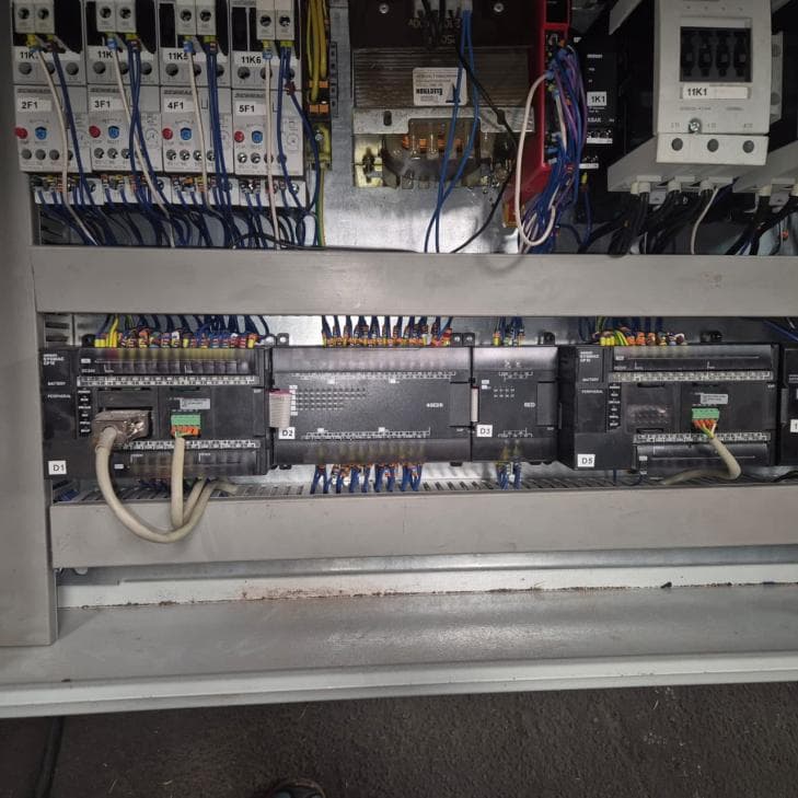 Previous jacking system control panel with Omron PLC modules and hardwired I/O